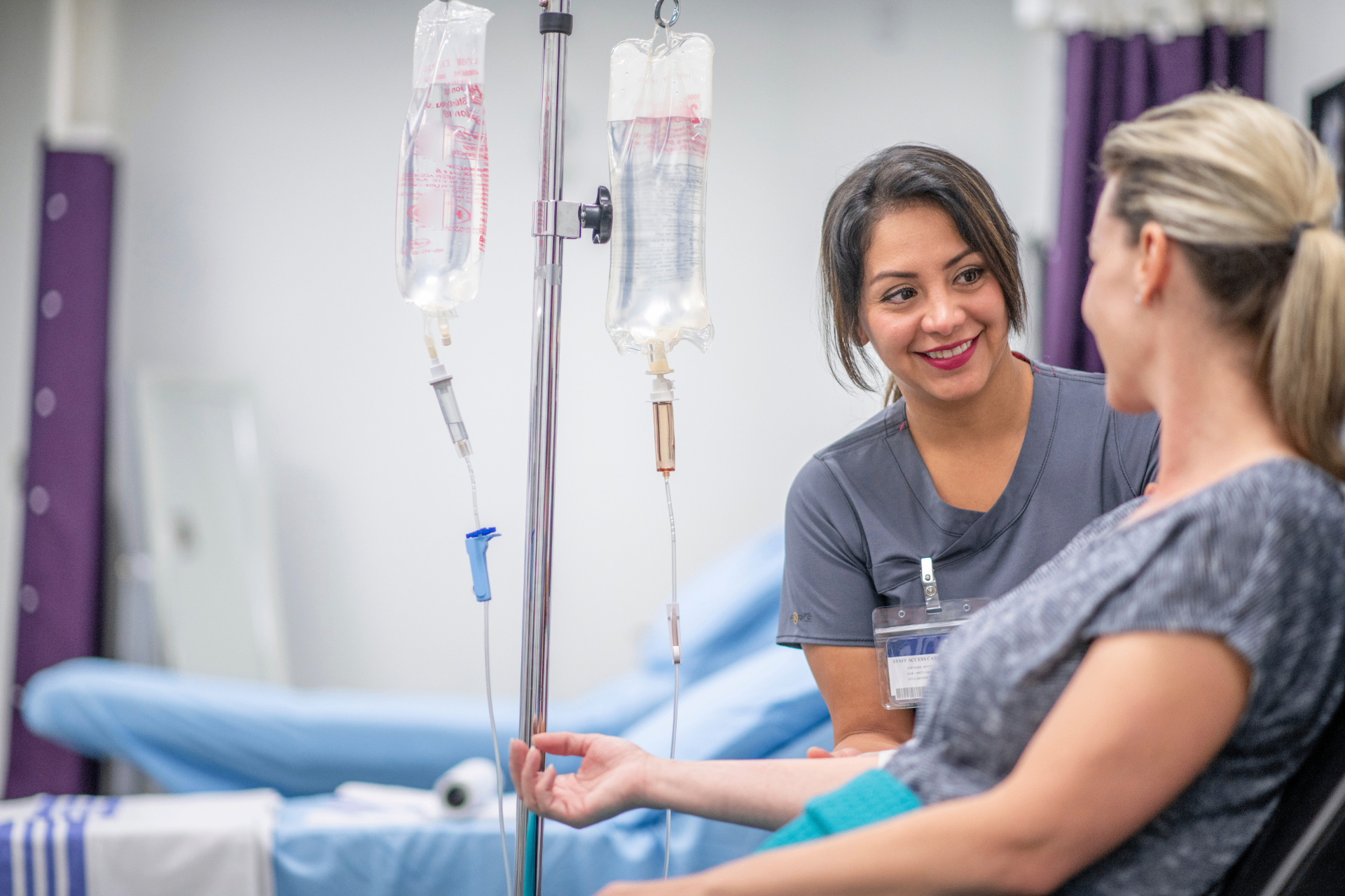 Registered Nurse with a guest during a stem cell IV infusion at iCRYO Boca Raton